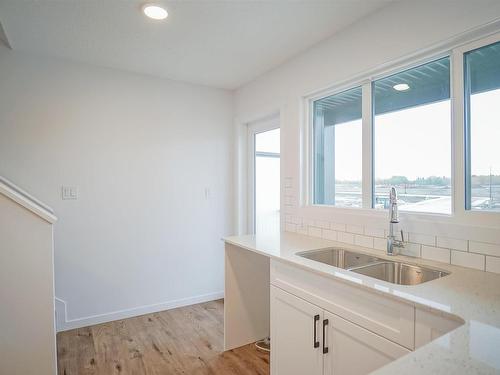 7044 Rosenthal Drive, Edmonton, AB - Indoor Photo Showing Kitchen With Double Sink