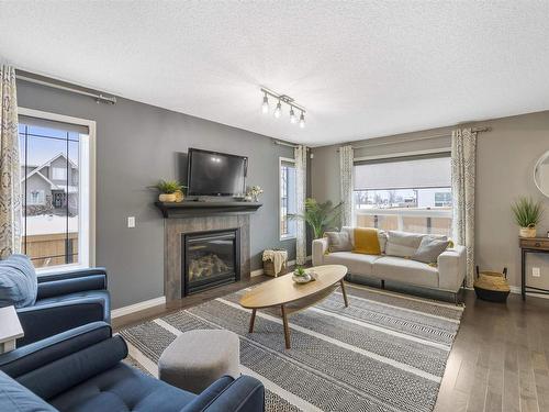 2 Norton Avenue, St. Albert, AB - Indoor Photo Showing Living Room With Fireplace