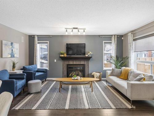 2 Norton Avenue, St. Albert, AB - Indoor Photo Showing Living Room With Fireplace