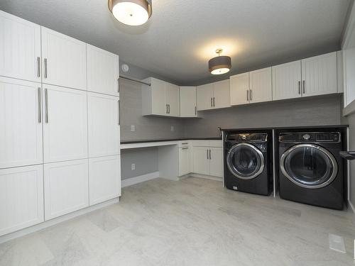 7549 May Common, Edmonton, AB - Indoor Photo Showing Laundry Room