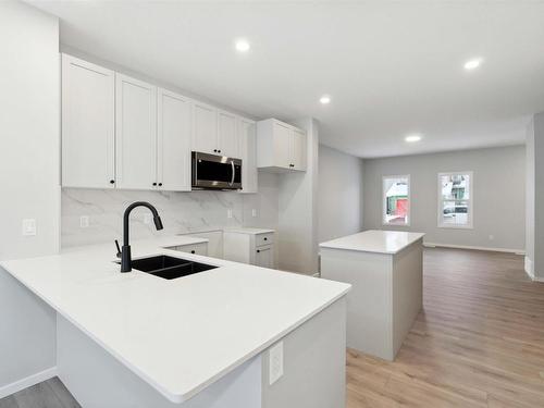 17727 70 Street, Edmonton, AB - Indoor Photo Showing Kitchen With Double Sink With Upgraded Kitchen