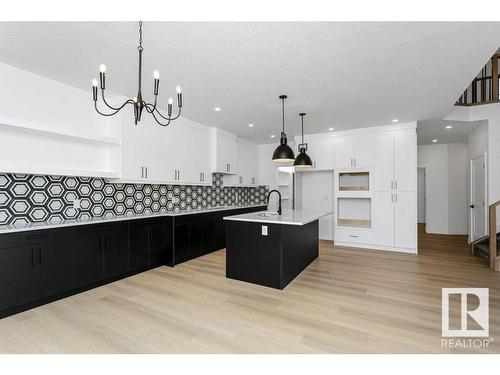 10 Dalquist Bay, Leduc, AB - Indoor Photo Showing Kitchen With Upgraded Kitchen