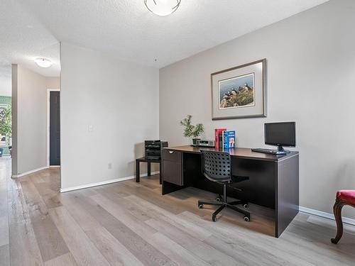 #179 St. Andrews Drive, Stony Plain, AB - Indoor Photo Showing Living Room With Fireplace