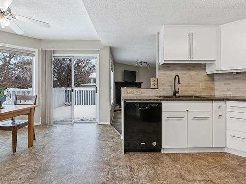 #179 St. Andrews Drive, Stony Plain, AB - Indoor Photo Showing Living Room With Fireplace