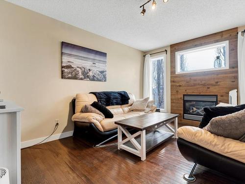 9057 Scott Crescent, Edmonton, AB - Indoor Photo Showing Living Room With Fireplace