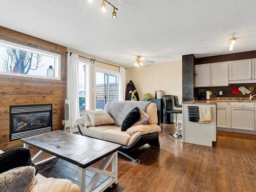 9057 Scott Crescent, Edmonton, AB - Indoor Photo Showing Living Room With Fireplace