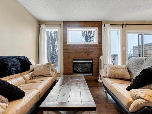 9057 Scott Crescent, Edmonton, AB - Indoor Photo Showing Living Room With Fireplace