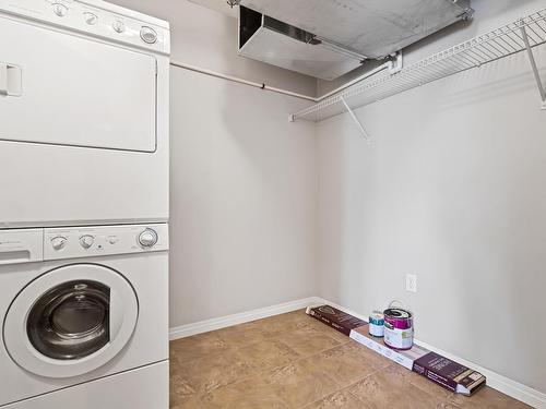 201 300 Spruce Ridge Road, Spruce Grove, AB - Indoor Photo Showing Laundry Room