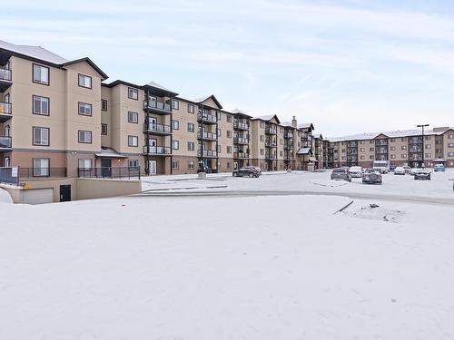 201 300 Spruce Ridge Road, Spruce Grove, AB - Outdoor With Balcony With Facade