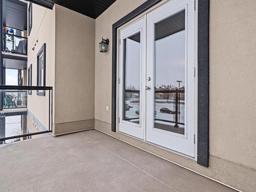 201 300 Spruce Ridge Road, Spruce Grove, AB - Outdoor With Balcony With Exterior