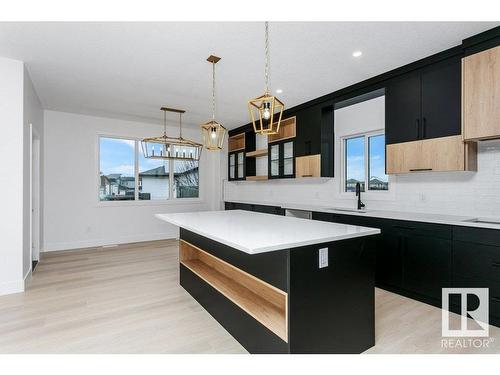 67 Dalquist Bay, Leduc, AB - Indoor Photo Showing Kitchen