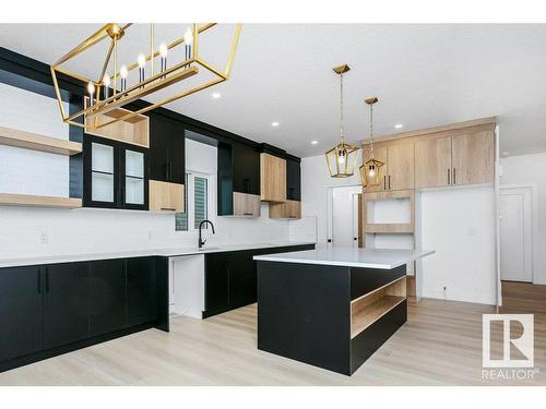 67 Dalquist Bay, Leduc, AB - Indoor Photo Showing Kitchen