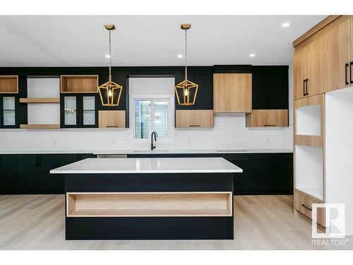 67 Dalquist Bay, Leduc, AB - Indoor Photo Showing Kitchen