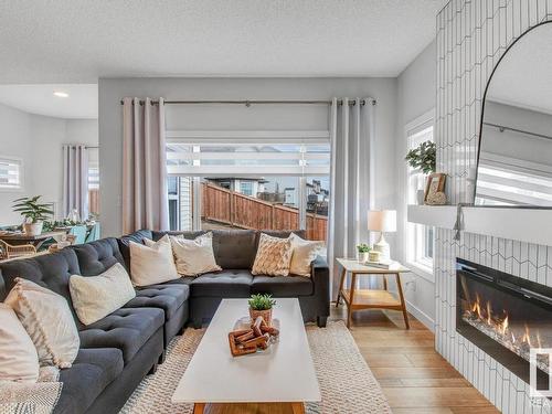 19011 20 Avenue, Edmonton, AB - Indoor Photo Showing Living Room With Fireplace