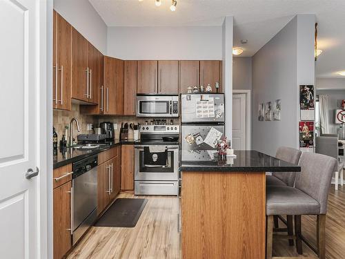 1203 9819 104 Street, Edmonton, AB - Indoor Photo Showing Kitchen With Stainless Steel Kitchen