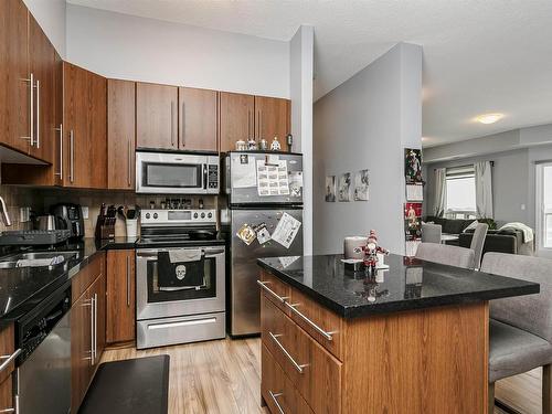 1203 9819 104 Street, Edmonton, AB - Indoor Photo Showing Kitchen With Stainless Steel Kitchen With Double Sink