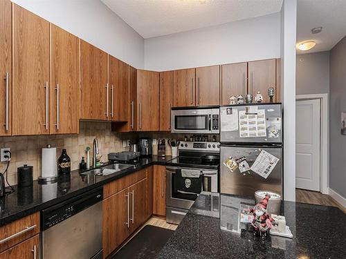 1203 9819 104 Street, Edmonton, AB - Indoor Photo Showing Kitchen With Stainless Steel Kitchen With Double Sink