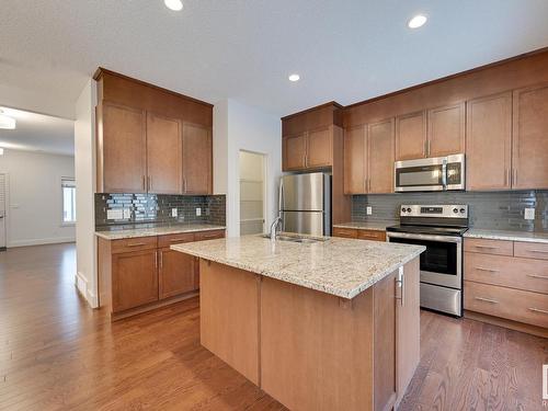 36 2003 Rabbit Hill Road, Edmonton, AB - Indoor Photo Showing Kitchen With Double Sink