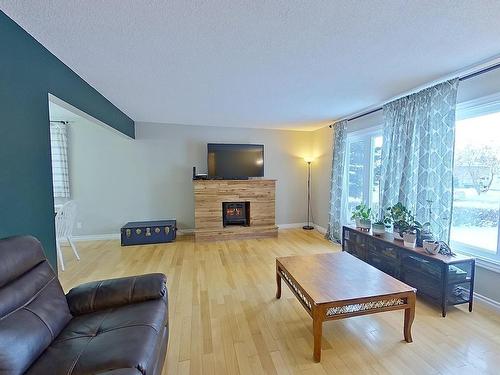 10512 104 Street, Westlock, AB - Indoor Photo Showing Living Room With Fireplace