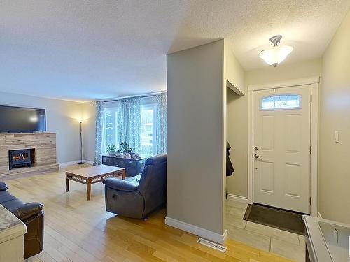 10512 104 Street, Westlock, AB - Indoor Photo Showing Other Room With Fireplace