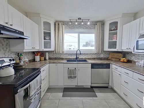 10512 104 Street, Westlock, AB - Indoor Photo Showing Kitchen With Double Sink