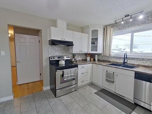 10512 104 Street, Westlock, AB - Indoor Photo Showing Kitchen With Double Sink