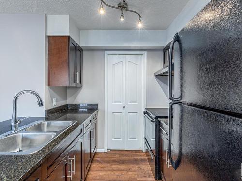 107 11804 22 Avenue, Edmonton, AB - Indoor Photo Showing Kitchen With Double Sink