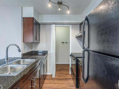 107 11804 22 Avenue, Edmonton, AB - Indoor Photo Showing Kitchen With Double Sink