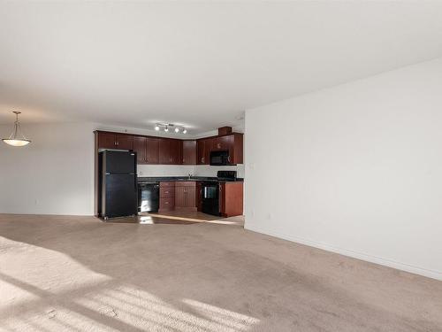 512 9910 107 Street, Morinville, AB - Indoor Photo Showing Kitchen