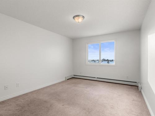 512 9910 107 Street, Morinville, AB - Indoor Photo Showing Other Room