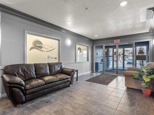 512 9910 107 Street, Morinville, AB - Indoor Photo Showing Living Room