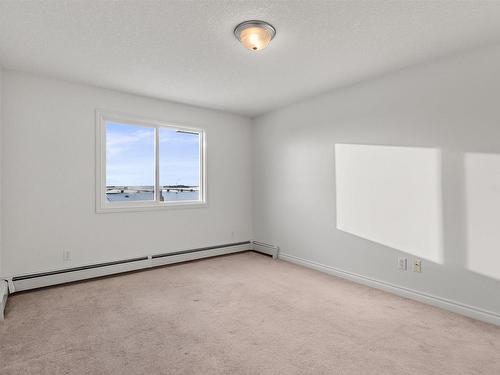 512 9910 107 Street, Morinville, AB - Indoor Photo Showing Other Room