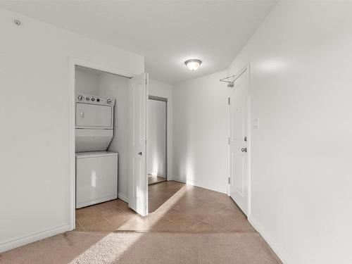 512 9910 107 Street, Morinville, AB - Indoor Photo Showing Laundry Room