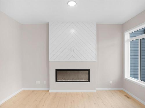 4826 170A Avenue, Edmonton, AB - Indoor Photo Showing Living Room With Fireplace