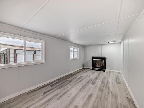 4712 51 Avenue, Wabamun, AB - Indoor With Fireplace