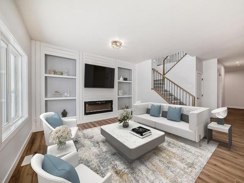 351 Bluff Cove, Leduc, AB - Indoor Photo Showing Living Room With Fireplace