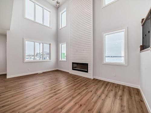 352 Bluff Cove, Leduc, AB - Indoor With Fireplace