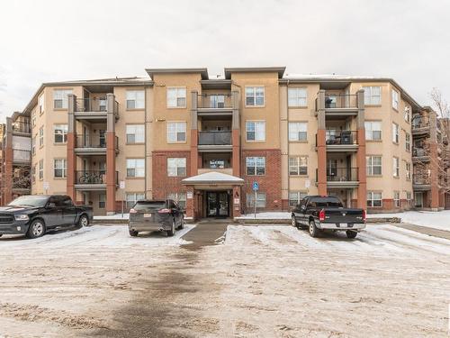 A313 11445 Ellerslie Road Sw, Edmonton, AB - Outdoor With Balcony With Facade