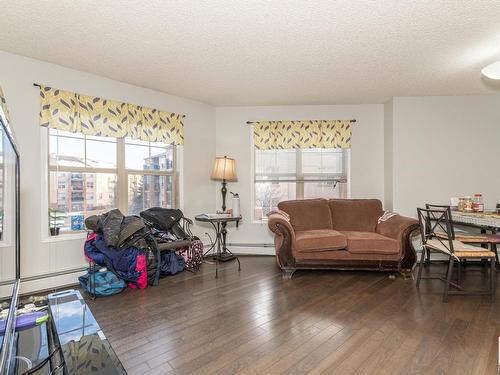 A313 11445 Ellerslie Road Sw, Edmonton, AB - Indoor Photo Showing Living Room