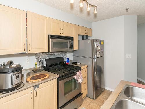 A313 11445 Ellerslie Road Sw, Edmonton, AB - Indoor Photo Showing Kitchen