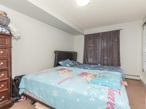 A313 11445 Ellerslie Road Sw, Edmonton, AB - Indoor Photo Showing Bedroom