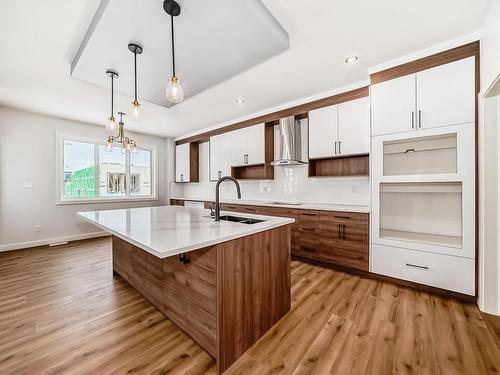 354 Bluff Cove, Leduc, AB - Indoor Photo Showing Kitchen With Double Sink