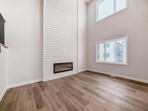 356 Bluff Cove, Leduc, AB - Indoor With Fireplace