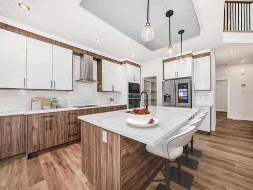 356 Bluff Cove, Leduc, AB - Indoor Photo Showing Kitchen With Upgraded Kitchen