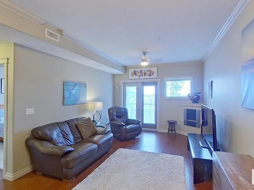 249 10121 80 Avenue, Edmonton, AB - Indoor Photo Showing Living Room