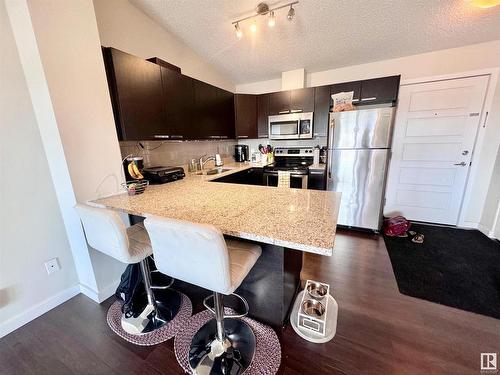 14808 125 Street, Edmonton, AB - Indoor Photo Showing Kitchen With Stainless Steel Kitchen With Double Sink