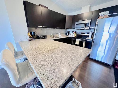 14808 125 Street, Edmonton, AB - Indoor Photo Showing Kitchen With Stainless Steel Kitchen With Double Sink