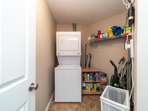 326 7801 Golf Course Road, Stony Plain, AB - Indoor Photo Showing Laundry Room