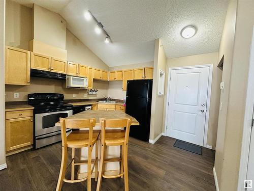 412 245 Edwards Dr, Edmonton, AB - Indoor Photo Showing Kitchen With Double Sink