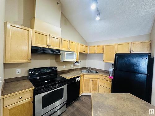 412 245 Edwards Dr, Edmonton, AB - Indoor Photo Showing Kitchen With Double Sink